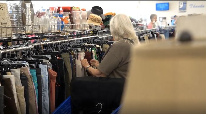 Customer sifting through the racks