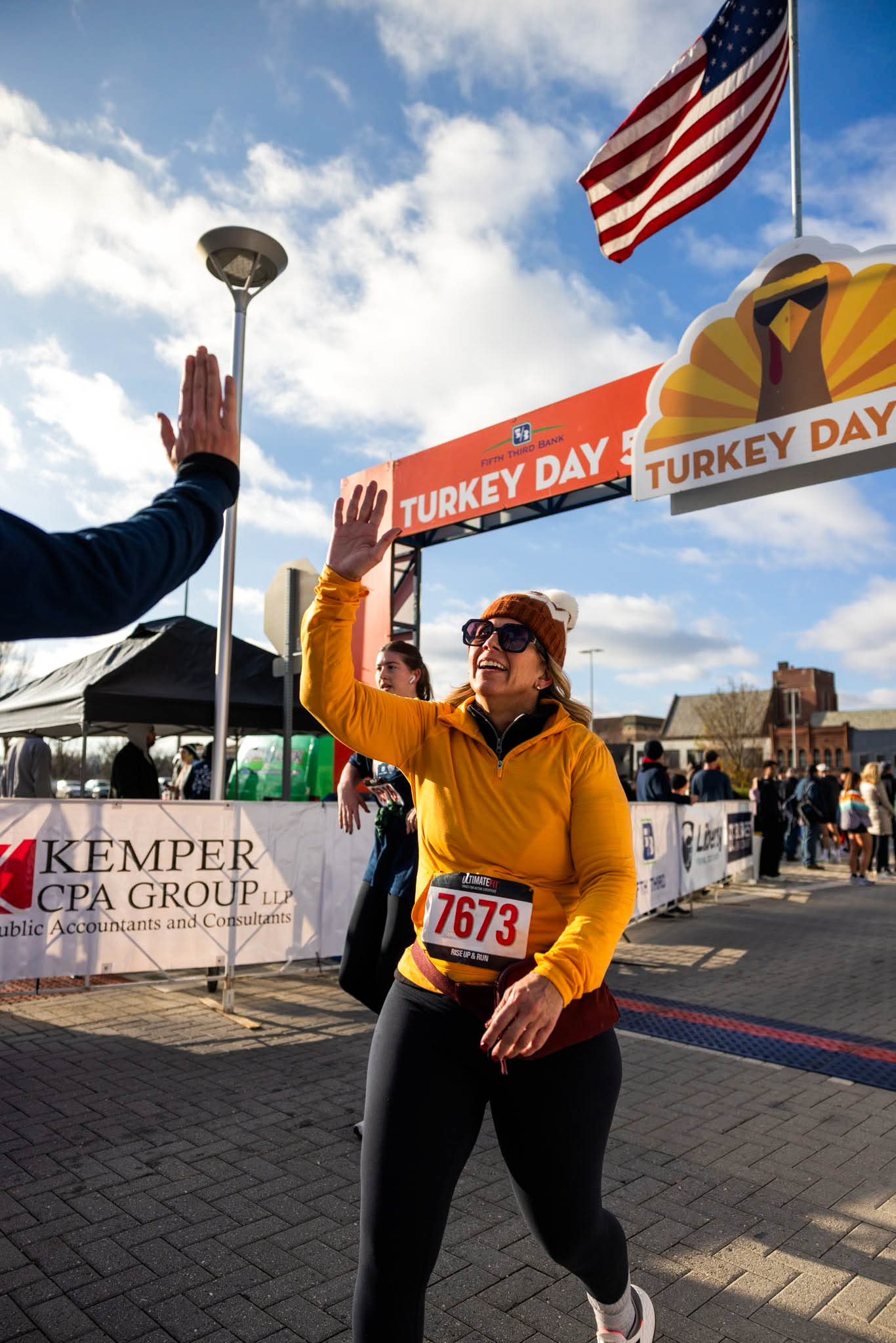 Turkey Day 5K participants celebrating after the race